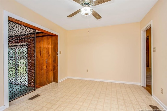 empty room with ceiling fan