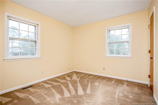 view of carpeted spare room