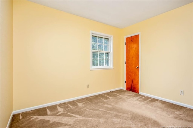 unfurnished room featuring carpet floors