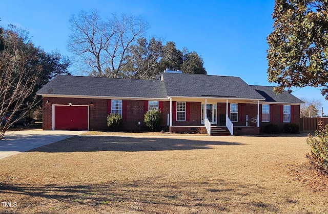 single story home featuring a garage and a porch