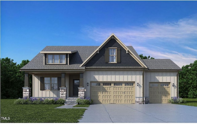 craftsman-style house featuring a garage, a front lawn, and covered porch