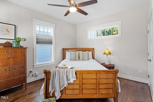 bedroom featuring dark wood-type flooring and ceiling fan