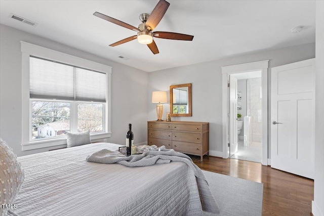 bedroom with dark wood-type flooring and ceiling fan