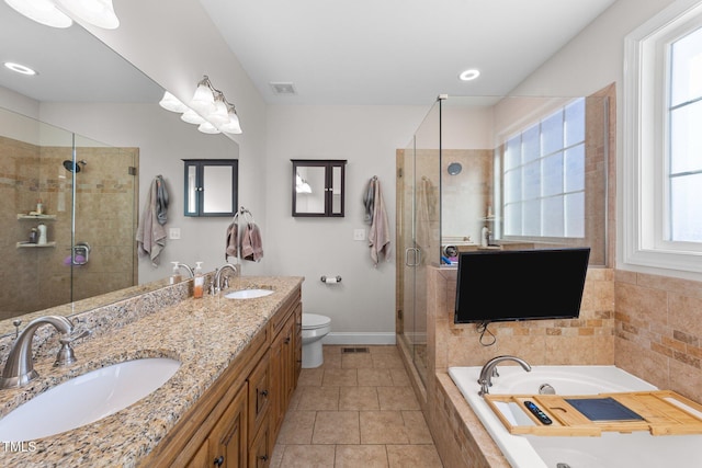 full bath with a sink, visible vents, and a shower stall