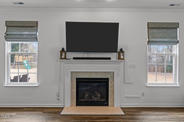 details featuring hardwood / wood-style flooring and crown molding