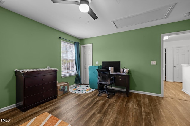 home office featuring wood-type flooring and ceiling fan