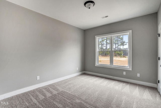 empty room featuring carpet floors