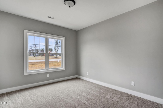 unfurnished room featuring carpet floors