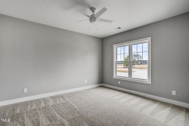 unfurnished room featuring carpet flooring and ceiling fan