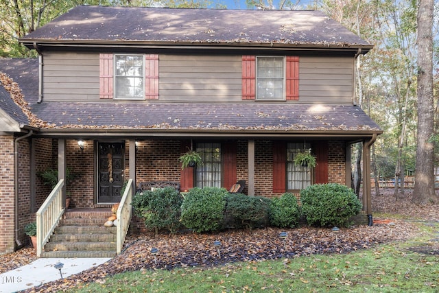 view of property with a porch