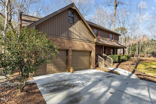 view of front of house with a garage and a porch