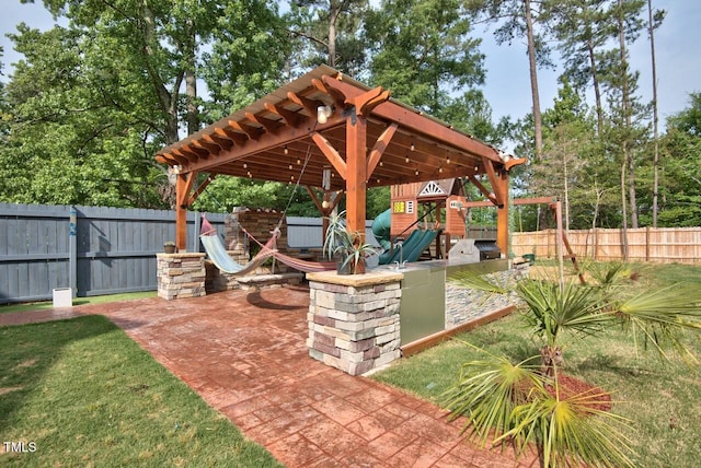 view of patio featuring a playground