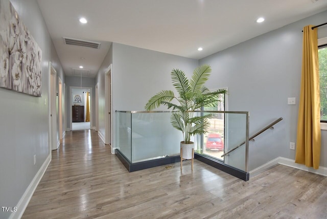 hall featuring light hardwood / wood-style floors