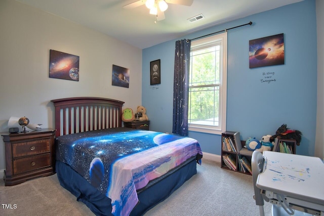 carpeted bedroom with ceiling fan