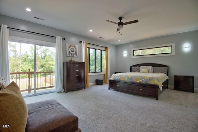 carpeted bedroom with access to outside and ceiling fan