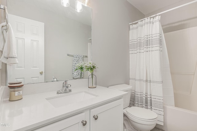 full bathroom featuring vanity, toilet, and shower / bath combo with shower curtain