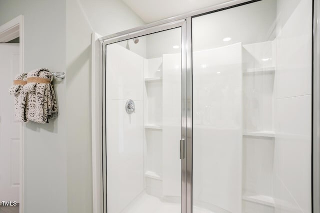 bathroom with an enclosed shower