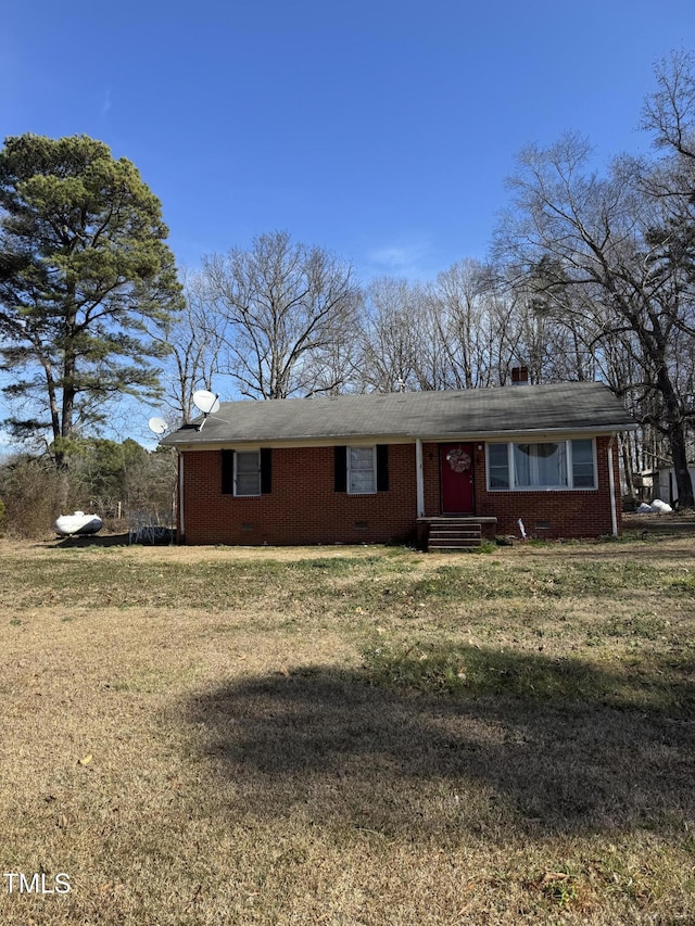 single story home featuring a front yard