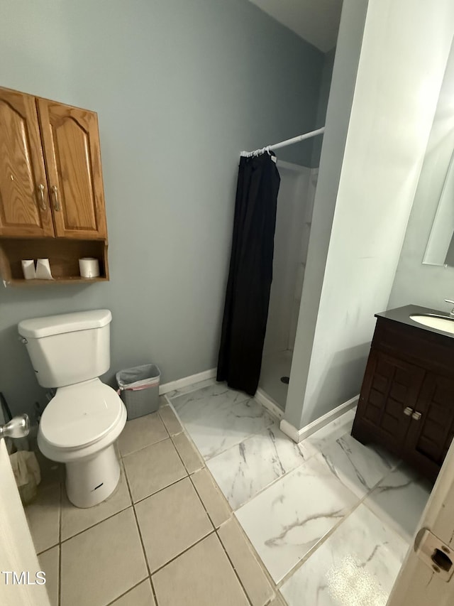 bathroom featuring vanity, a shower with curtain, and toilet