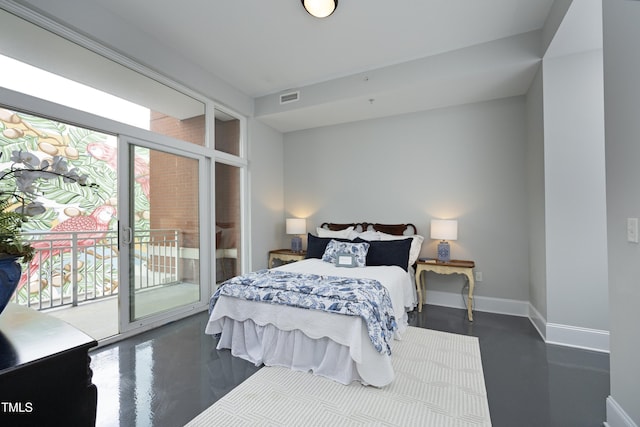 bedroom featuring access to outside, baseboards, visible vents, and multiple windows