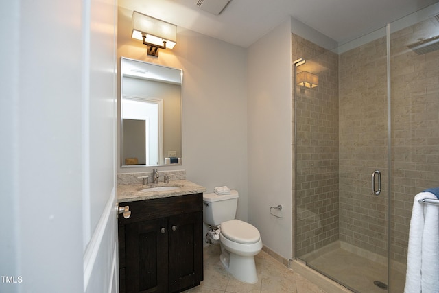 bathroom featuring visible vents, tile patterned flooring, a shower stall, vanity, and toilet