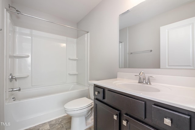 full bathroom with vanity, toilet, and washtub / shower combination