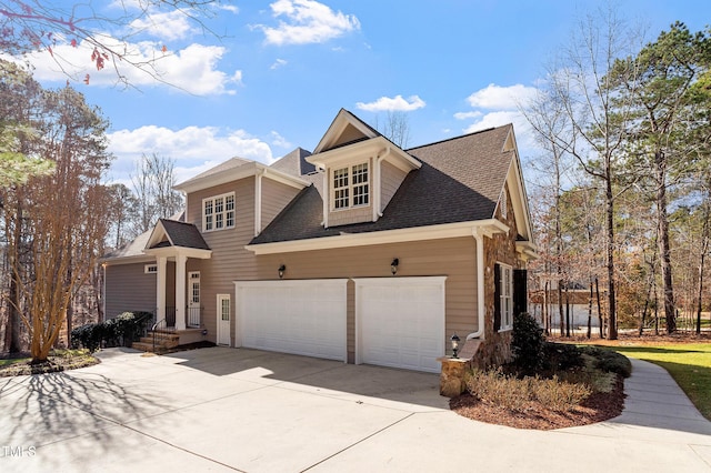 view of front of property with a garage