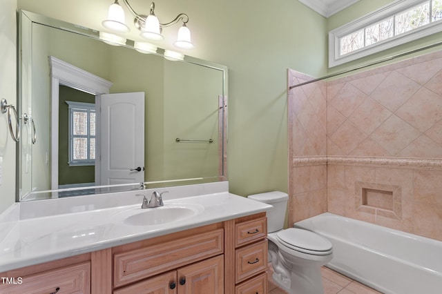 full bathroom featuring vanity, a wealth of natural light, tile patterned floors, and toilet