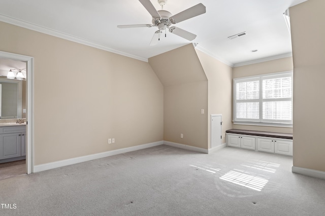 bonus room featuring sink, vaulted ceiling, light colored carpet, and ceiling fan