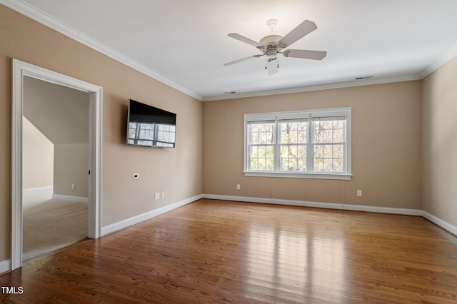 unfurnished room featuring crown molding, light hardwood / wood-style floors, and ceiling fan