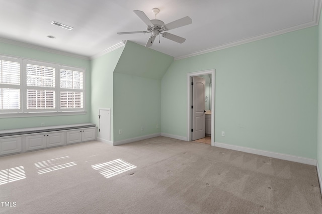 additional living space featuring ceiling fan and light carpet