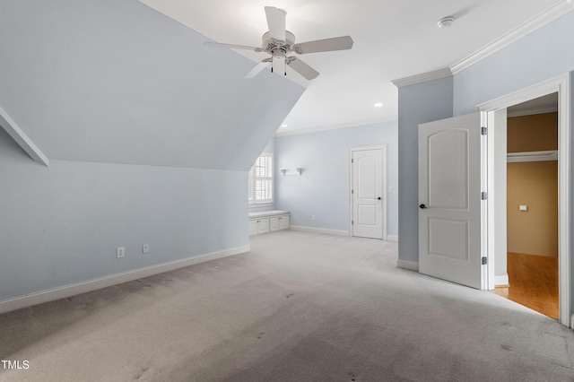 bonus room with lofted ceiling, light colored carpet, and ceiling fan