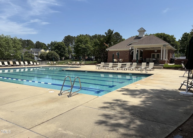 10014 Hammock Bnd, Chapel Hill, NC 27517 - community pool featuring a patio area and view of scattered trees
