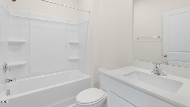 full bathroom with shower / tub combination, vanity, and toilet