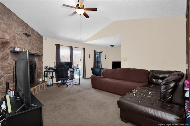 carpeted living room featuring ceiling fan and vaulted ceiling