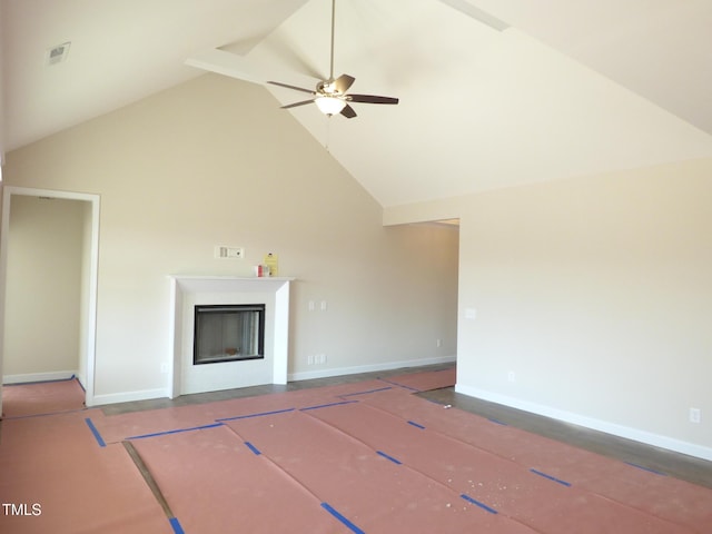 unfurnished living room with high vaulted ceiling and ceiling fan