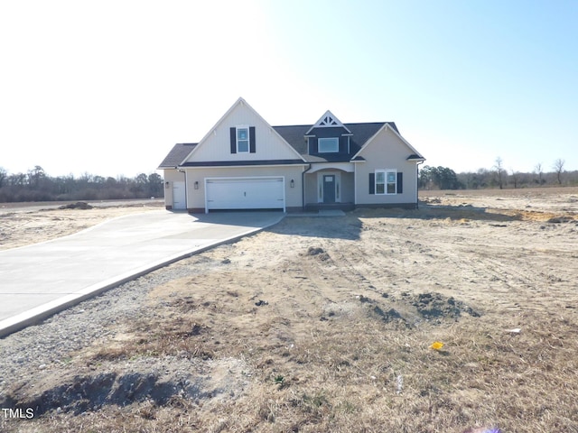 view of front of property with a garage