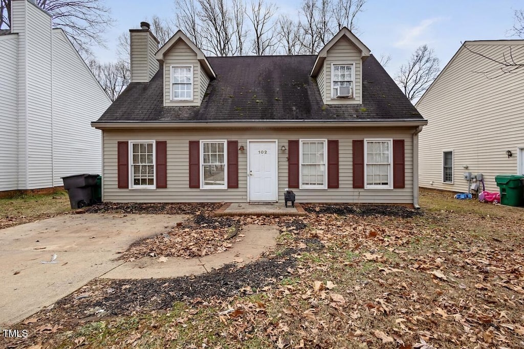 view of new england style home