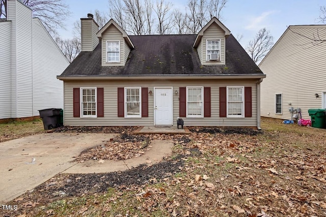 view of new england style home