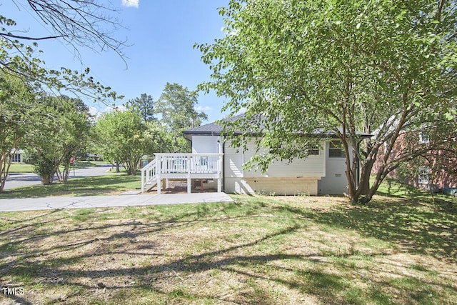 view of yard with a deck