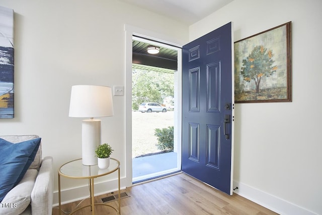 foyer entrance featuring light hardwood / wood-style floors