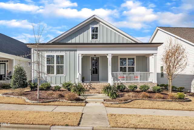 view of front of property with board and batten siding and a porch