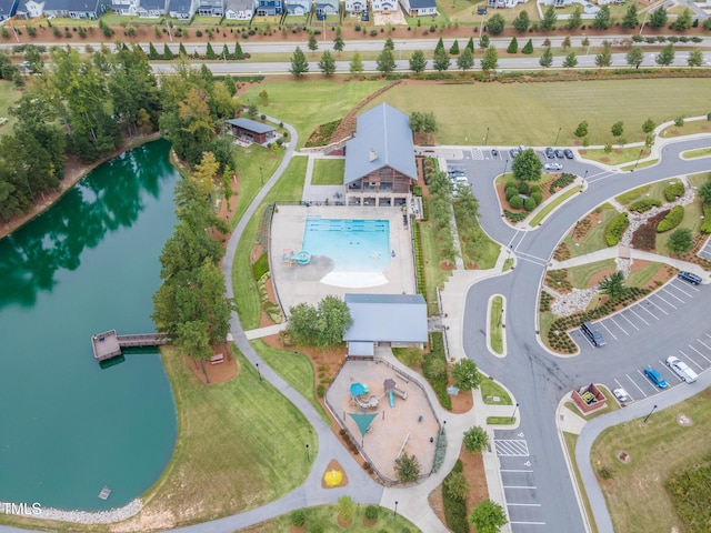 drone / aerial view with a water view