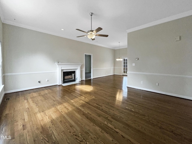 unfurnished living room with crown molding, dark hardwood / wood-style floors, and ceiling fan with notable chandelier