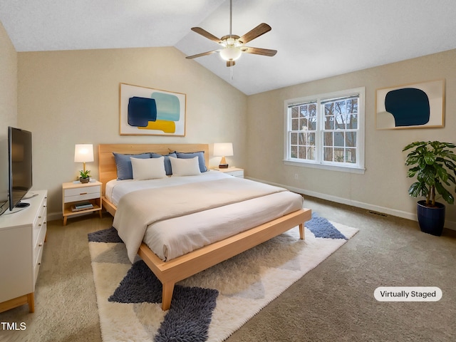 bedroom with lofted ceiling, light colored carpet, and ceiling fan