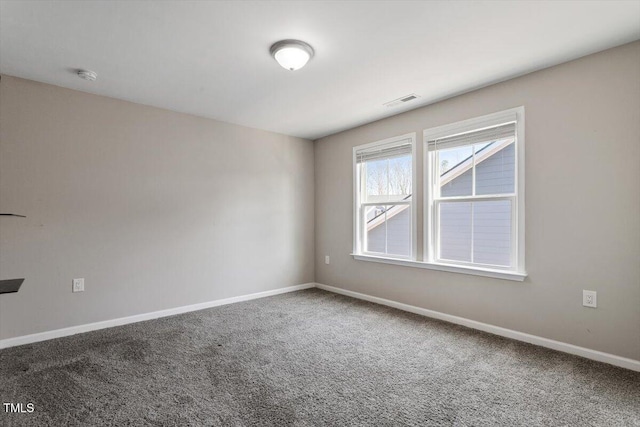 spare room with carpet floors