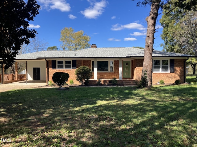 single story home with a carport and a front lawn