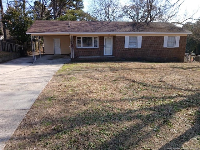 single story home featuring a carport and a front yard