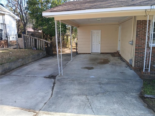 view of patio / terrace with a carport