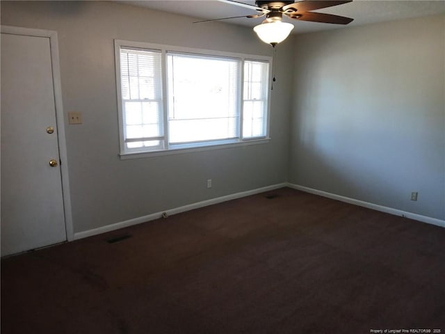 carpeted empty room with ceiling fan